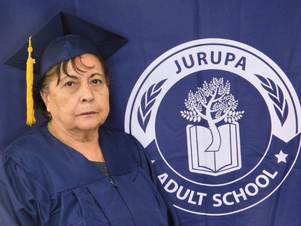 Isabel Hernandez next to JUSD Adult School logo