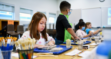 Glen Avon student rolls clay