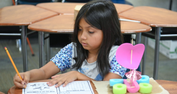 Sunnyslope student writing about her STEM activity