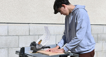 Student using table saw