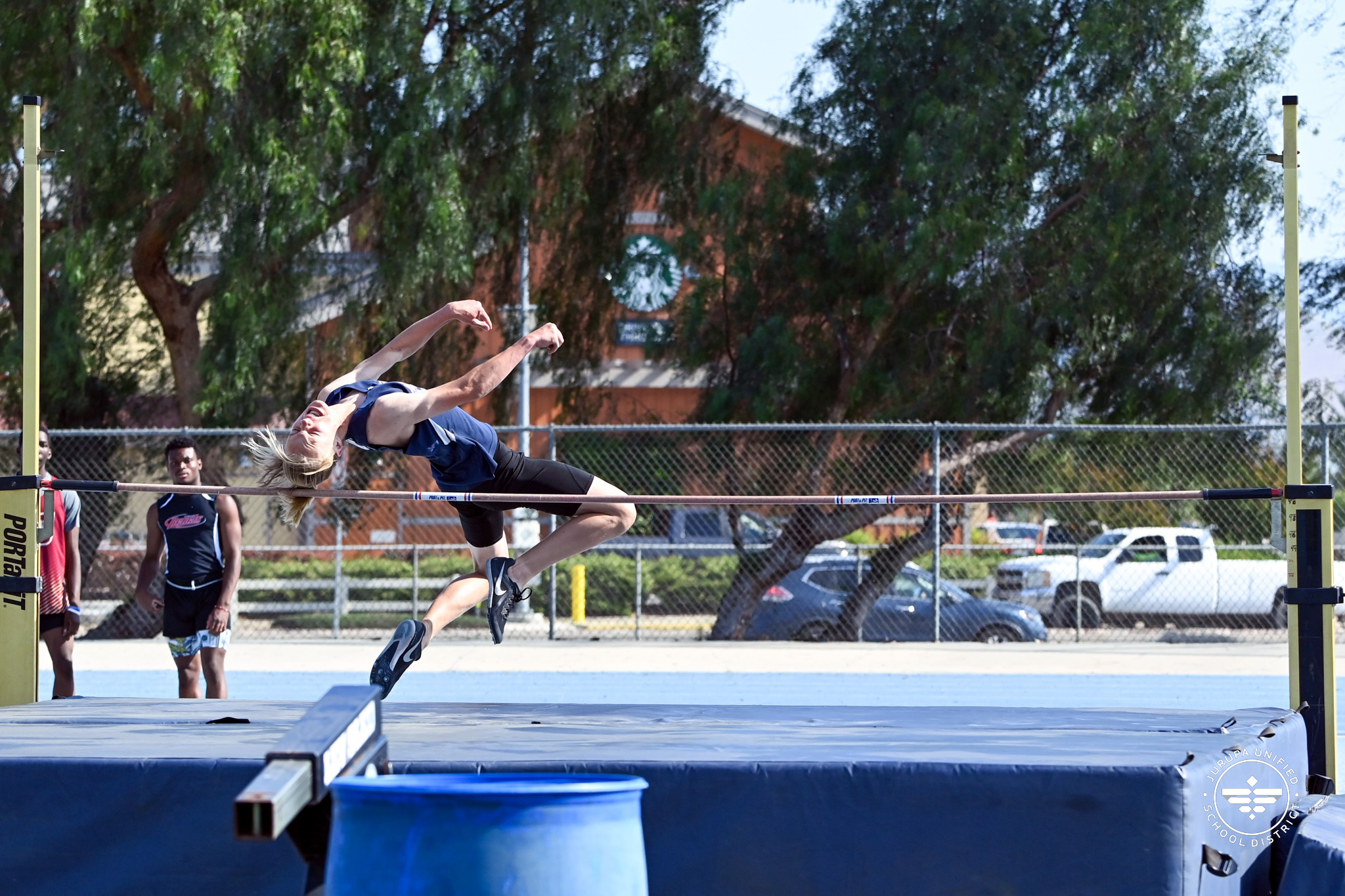 JVHS athlete performing a high jump