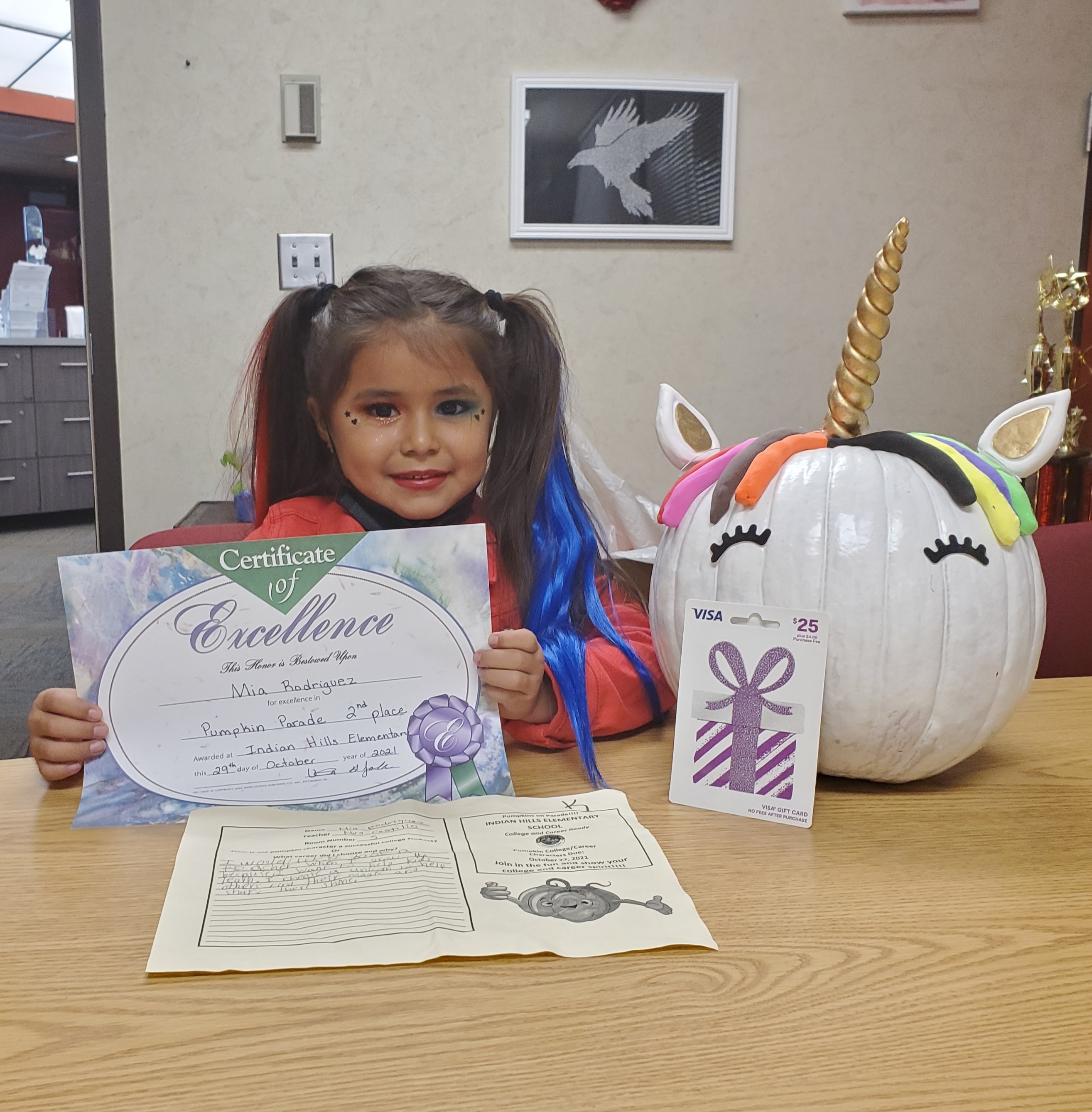 Student and unicorn pumpkin