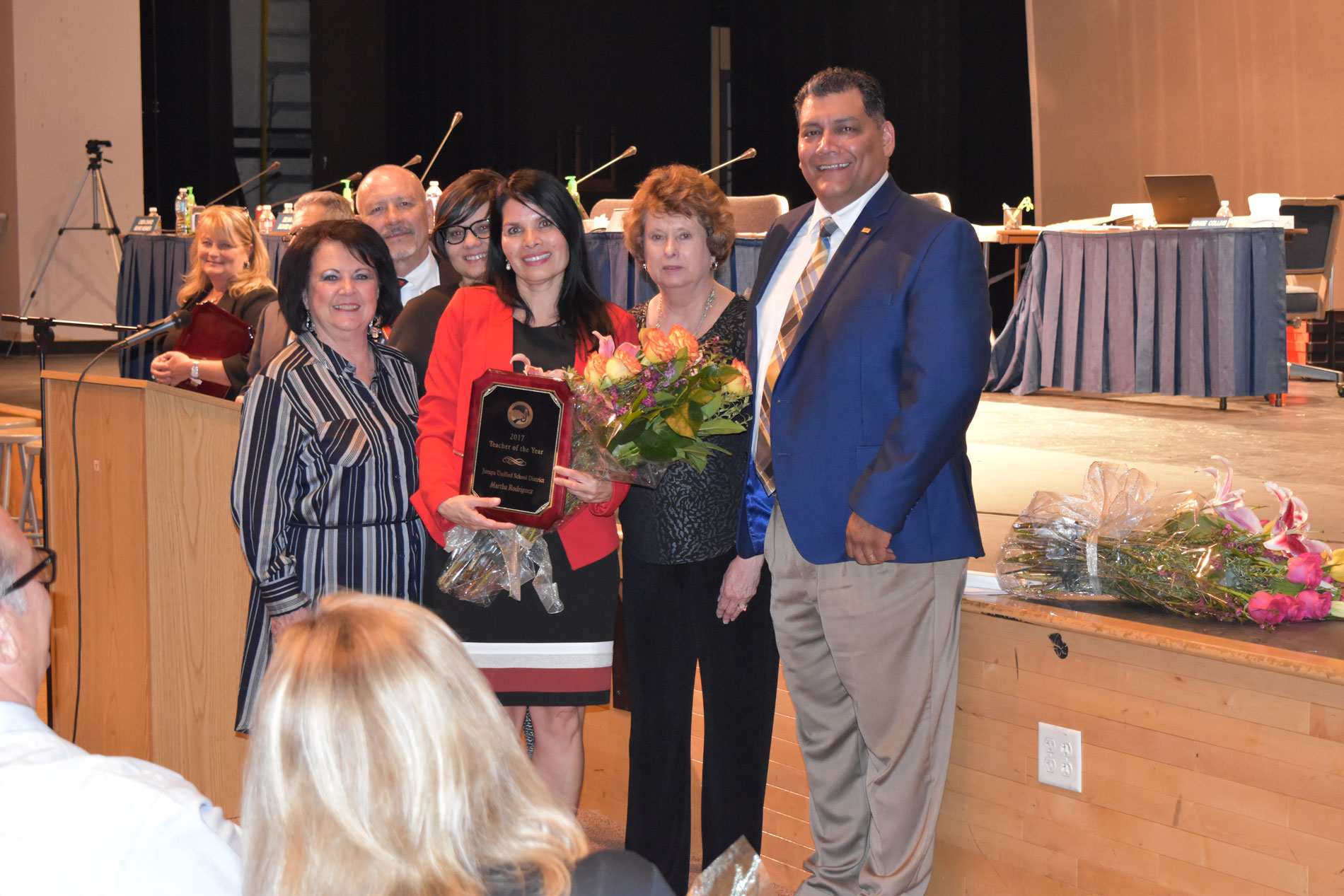 Martha Rodriguez receiving award for TOY