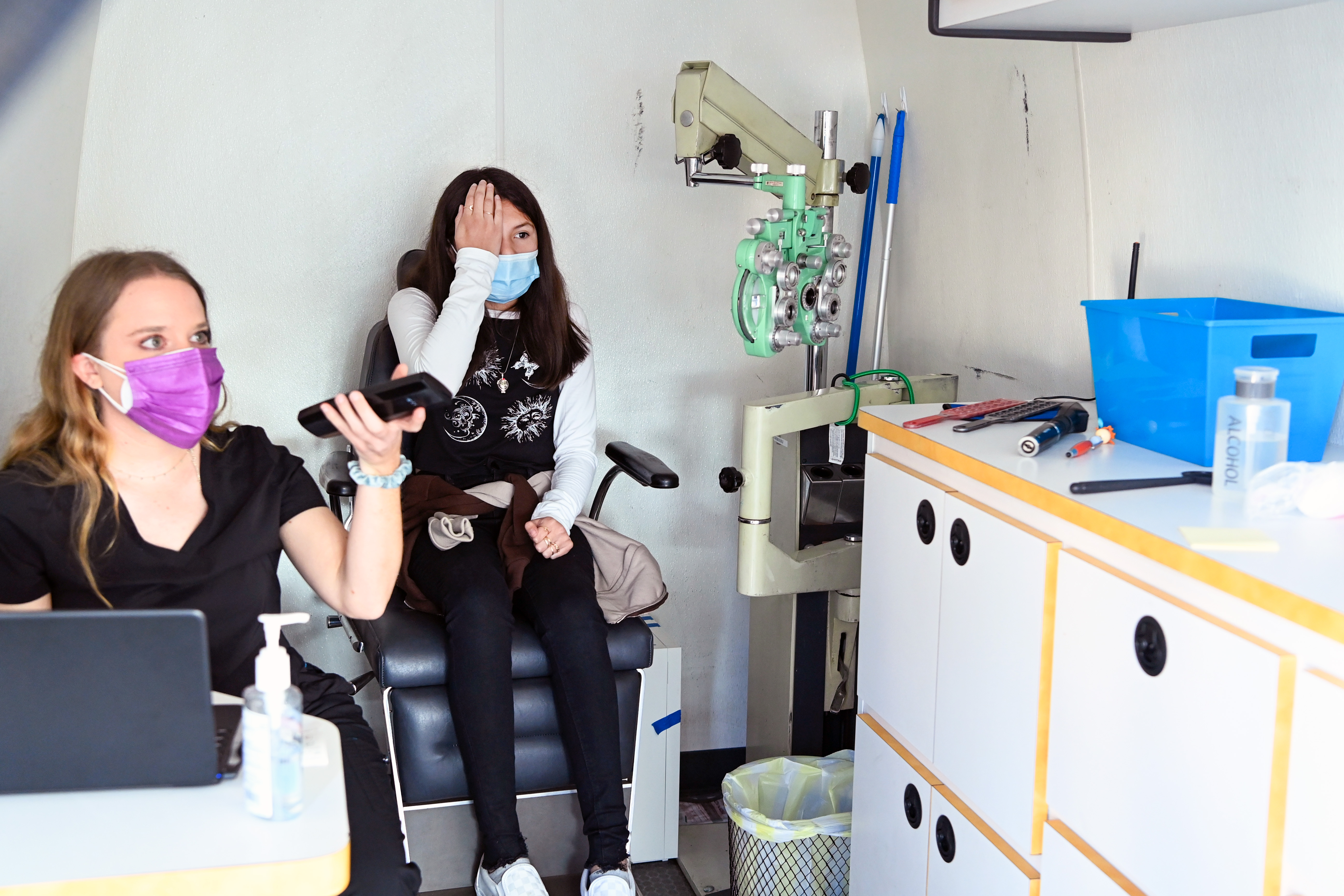 student receives eye exam