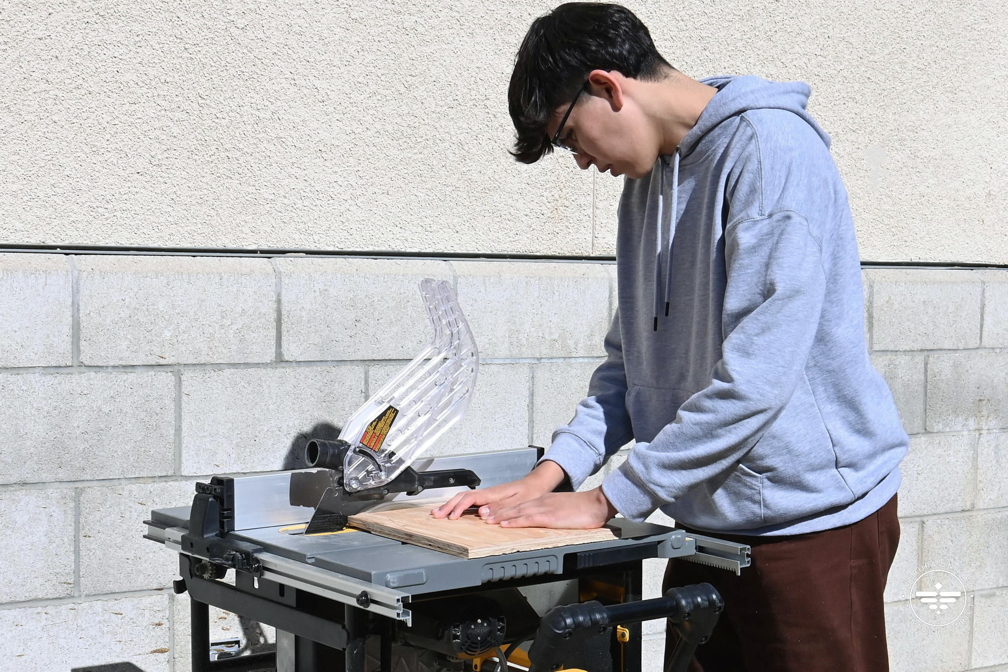 Student using table saw