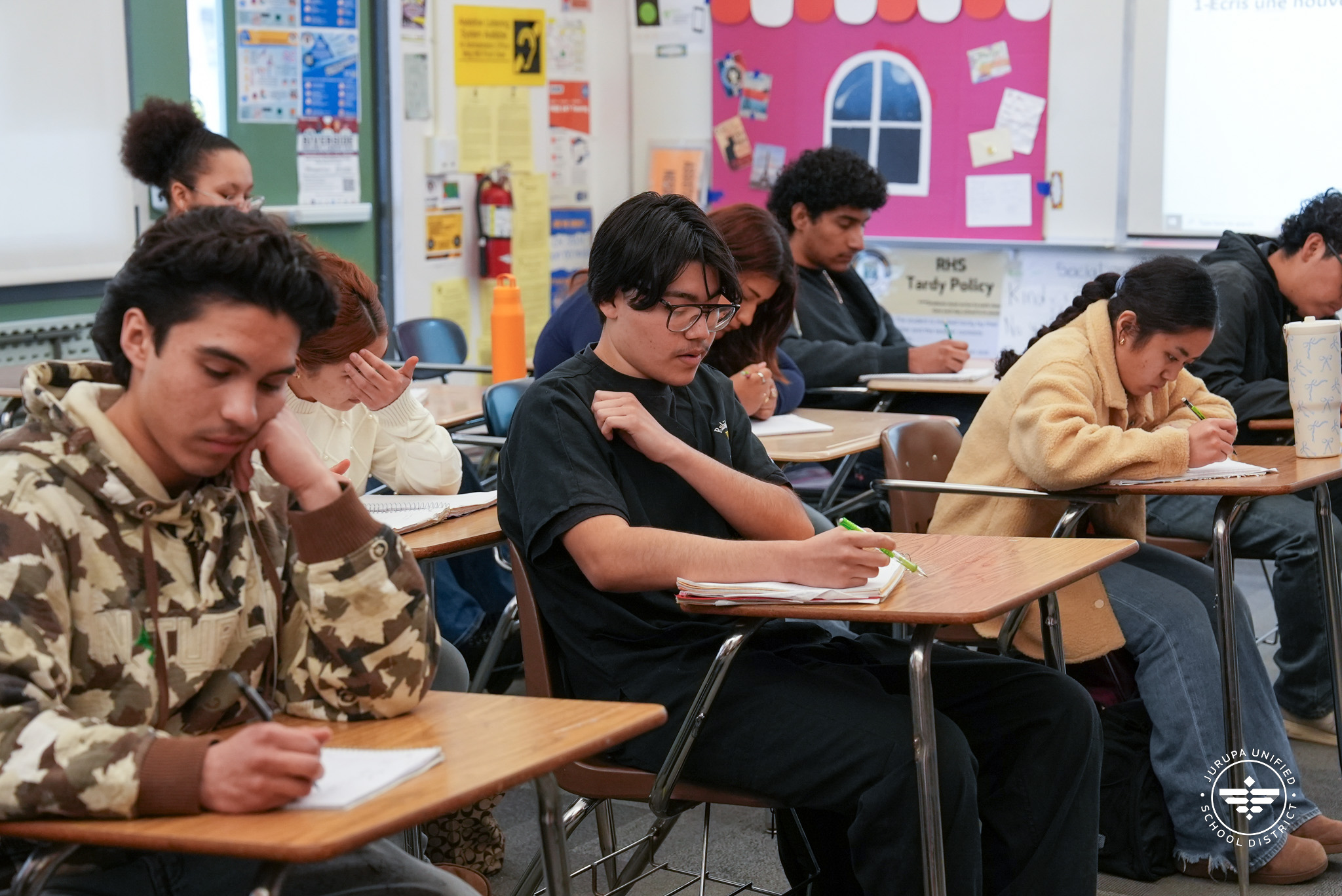 French IV students in class doing work