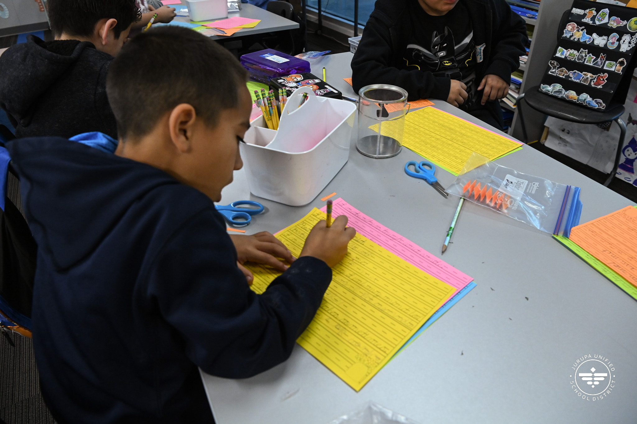 a student practicing their cursive skills by writing positive affirmations