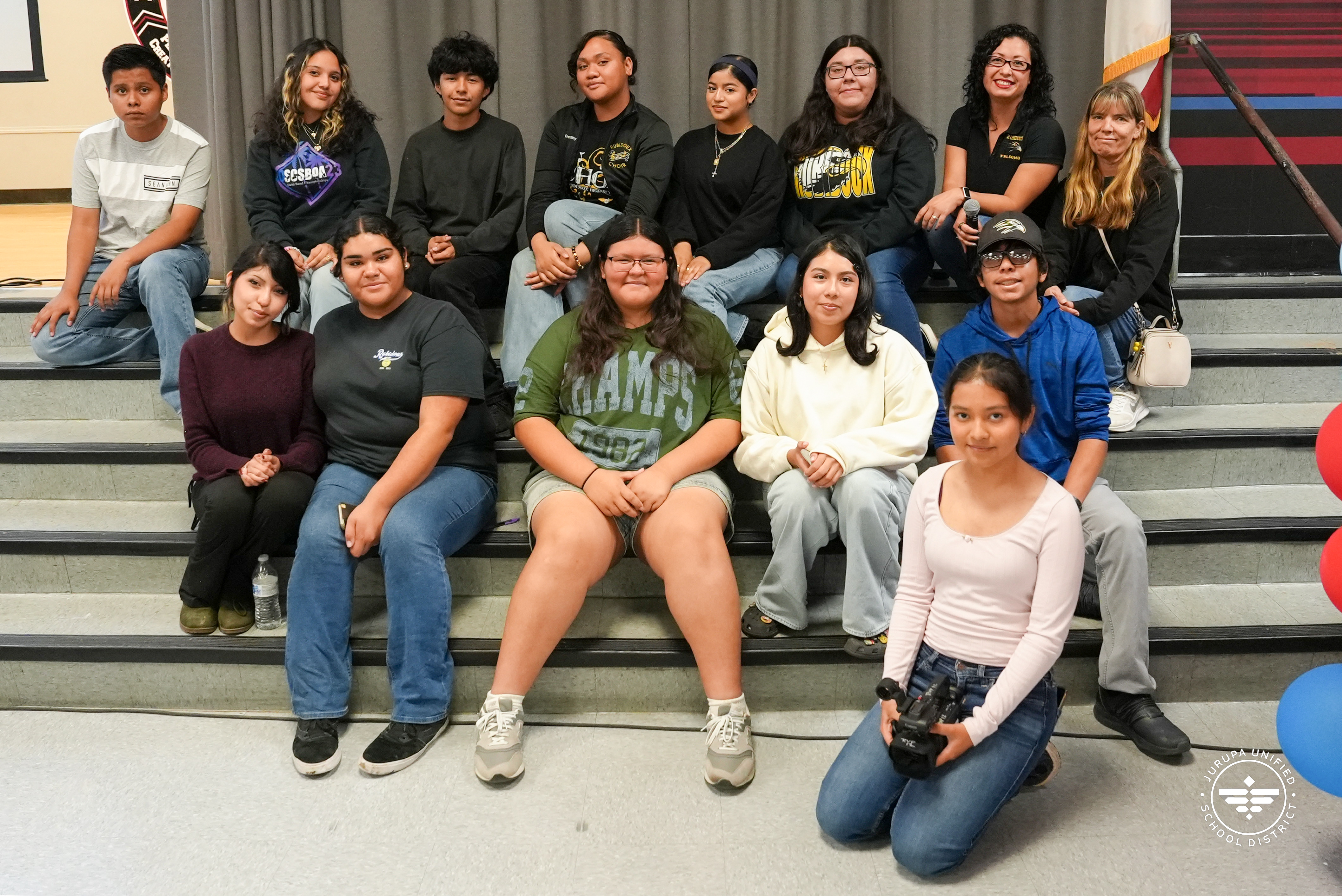 Rubidoux High School students posing for a photo after their presentations at Mission Middle School